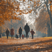 People walking in an English park in autumn